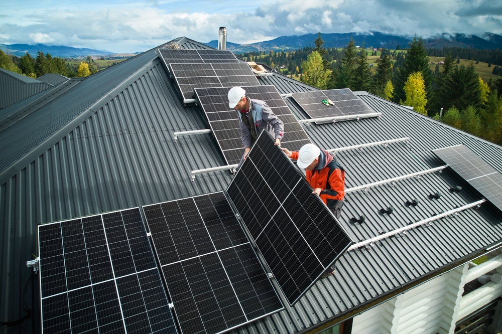 Roofers,Building,Photovoltaic,Solar,Module,Station,On,Roof,Of,House.